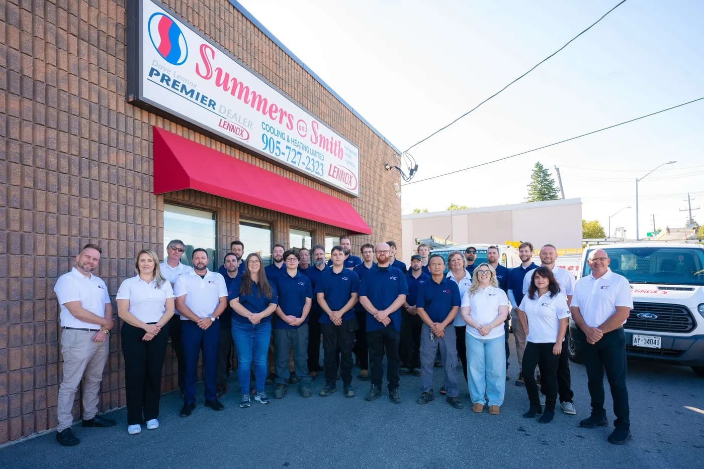 Summers & Smith team outside the Aurora showroom