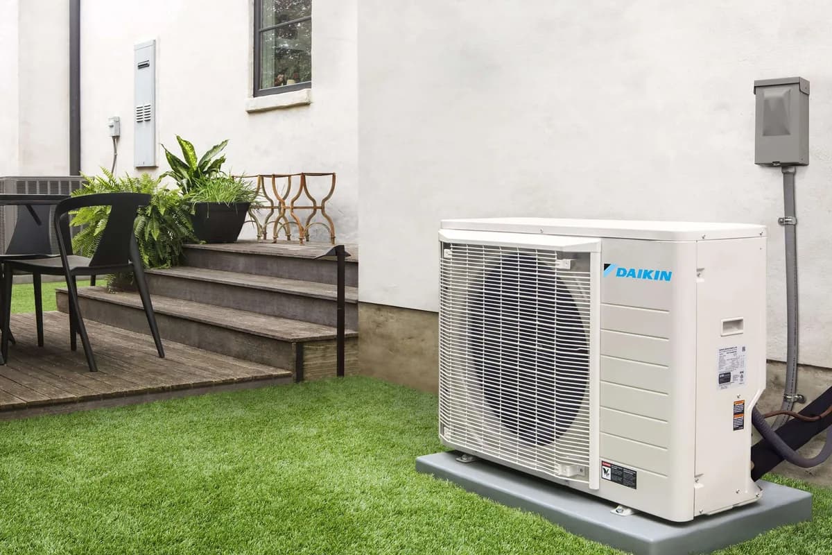 Daikin FIT outdoor unit beside a home